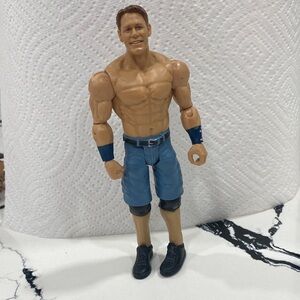 WWE Action Figure with Blue Shorts and Black Shoes